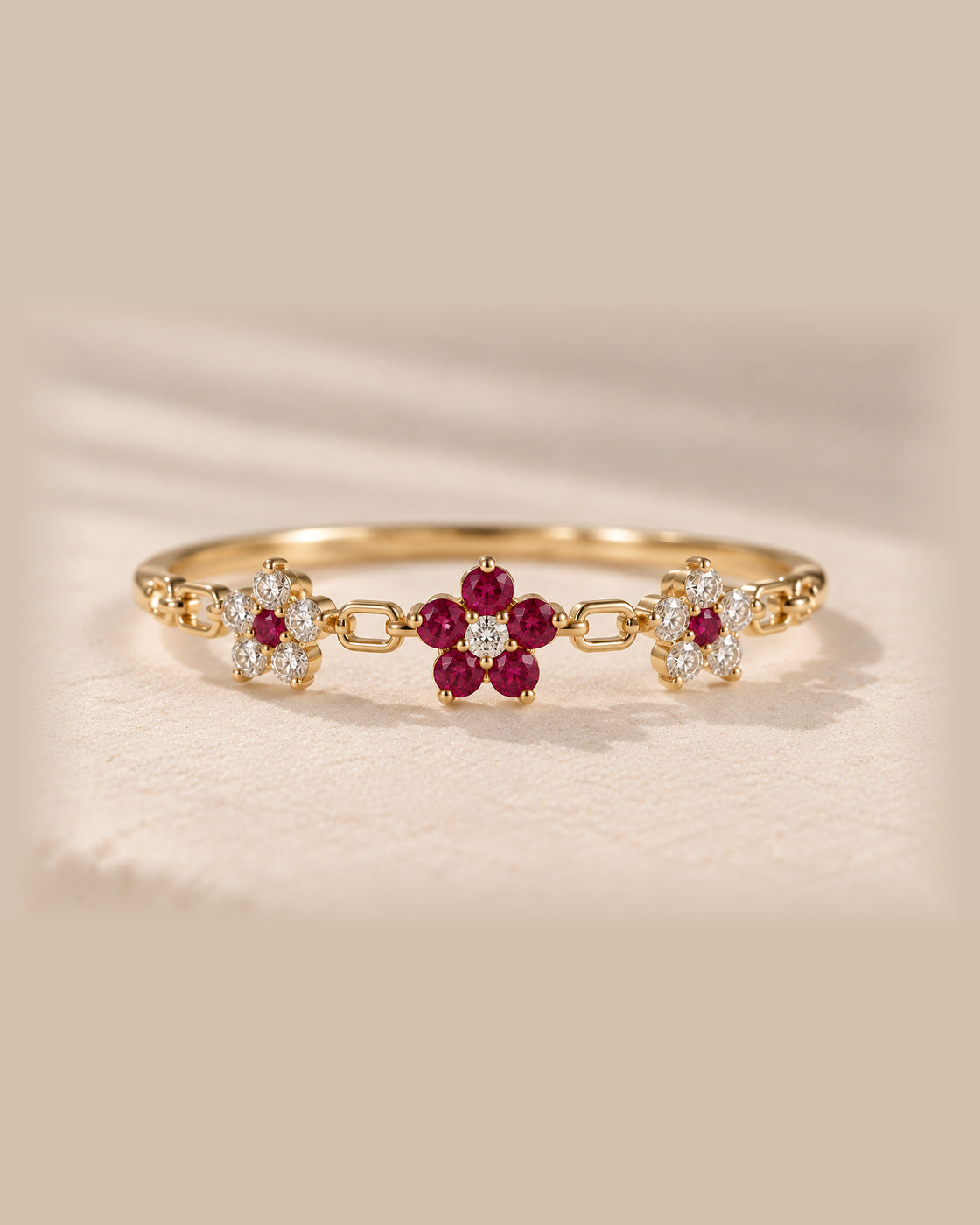 EVELYNNIE Floral Garland Ring in 18K yellow gold with rubies and natural diamonds, front view