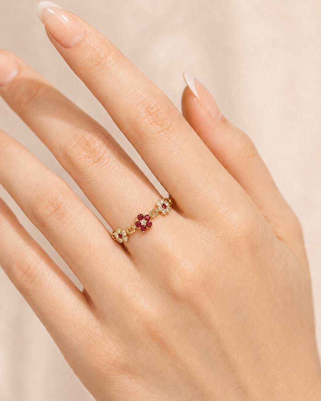 EVELYNNIE Floral Garland Ring with rubies and natural diamonds worn on hand